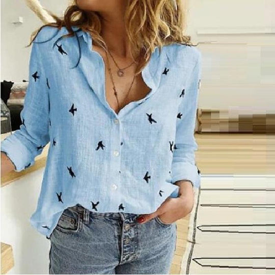 Damen Atmungsaktive Baumwoll‑Leinen Tunika‑Bluse mit Kentkragen, geknöpftem V‑Ausschnitt und gerundetem Saum Shop Nory