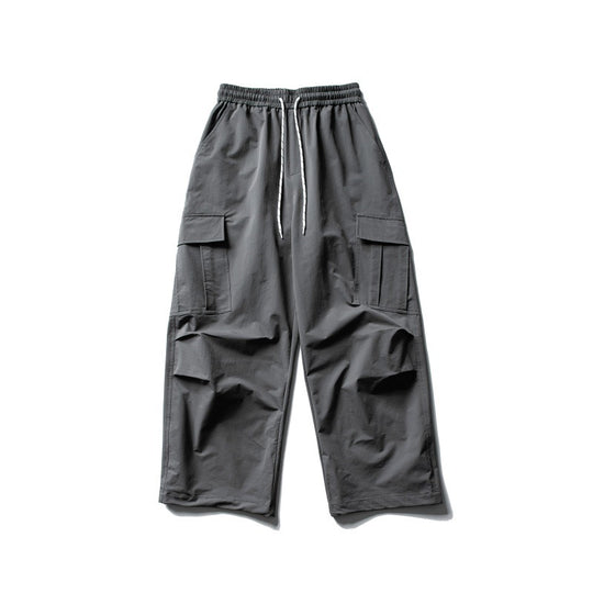 Unisex Weite Cargo-Utility-Hose im Baggy-Schnitt mit elastischem Kordelbund und großzügigen Klappentaschen Shop Nory
