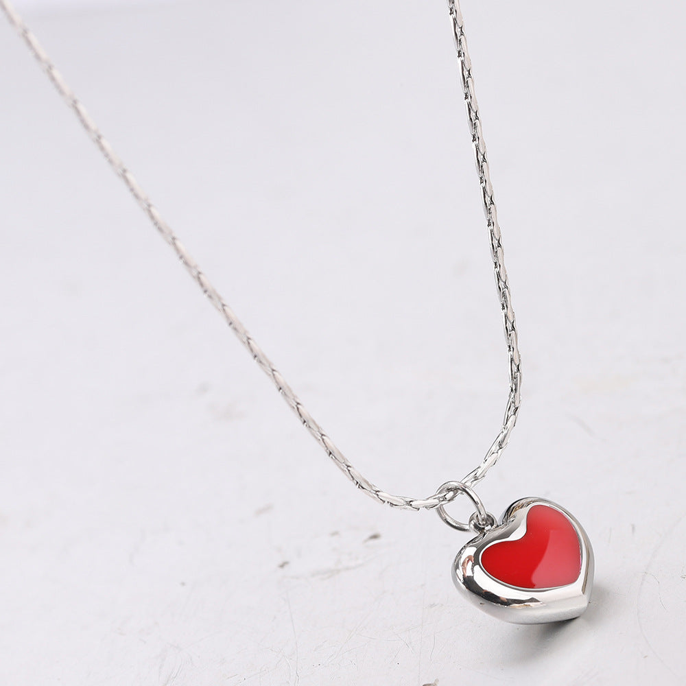 Damen Halskette mit Herzanhänger aus Edelstahl und rotem Zirkonia Shop Nory