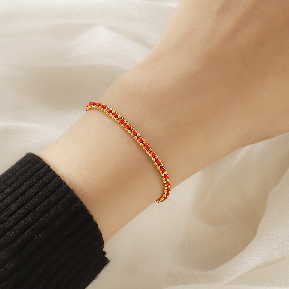Damen romantisches Armband mit funkelnden roten Zirkonia Shop Nory