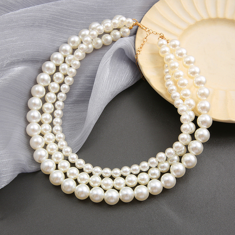 Damen elegante Perlenhalskette mit detailliertem Kettendesign Shop Nory