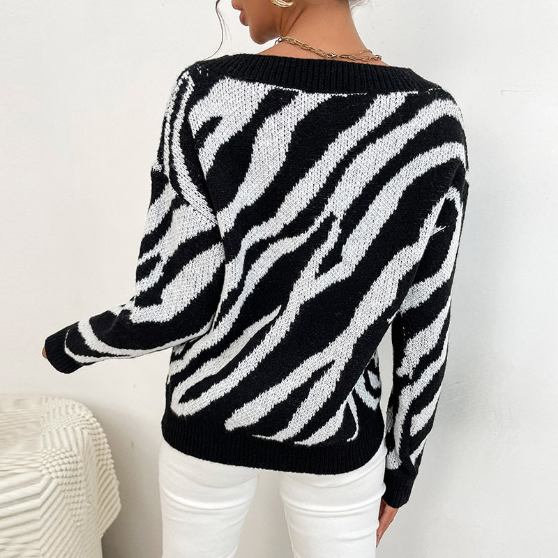 Damen Oversize V-Ausschnitt Pullover mit Zebra-Jacquard und gerippten Bündchen Shop Nory