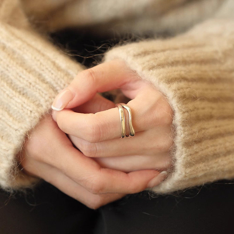 Damen Eleganter und geschwungener Silberring mit minimalistischer Ästhetik Shop Nory