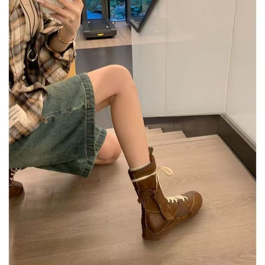 Damen Schnür-Ankleboots mit dekorativer Ziernaht, Riemenverschluss und markanter Profilsohle Shop Nory
