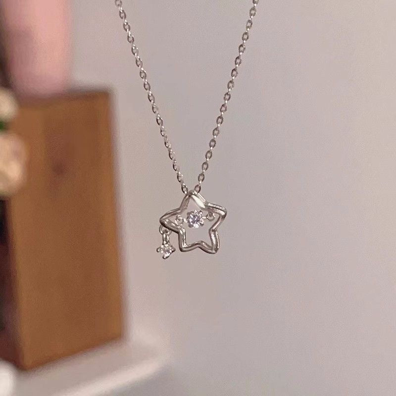 Damen Halskette mit funkelndem Stern-Anhänger und filigranem Design Shop Nory