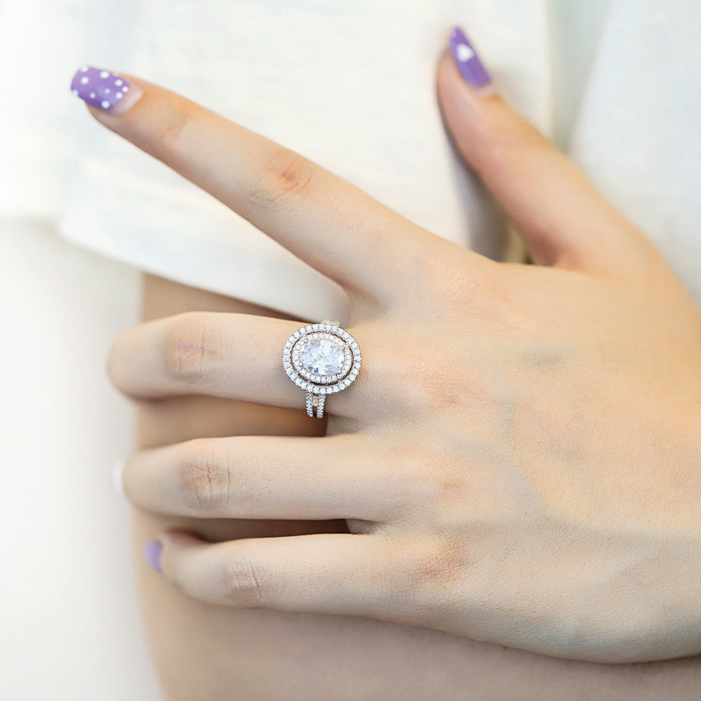 Damen Luxuriöser Verlobungsring mit ovalem Edelstein und funkelndem Zirkonia-Besatz Shop Nory