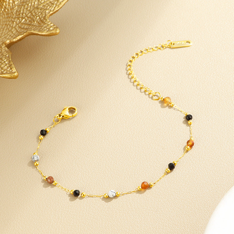 Damen elegantes Armband mit bunten Edelstein-Details und feiner Kettenstruktur Shop Nory
