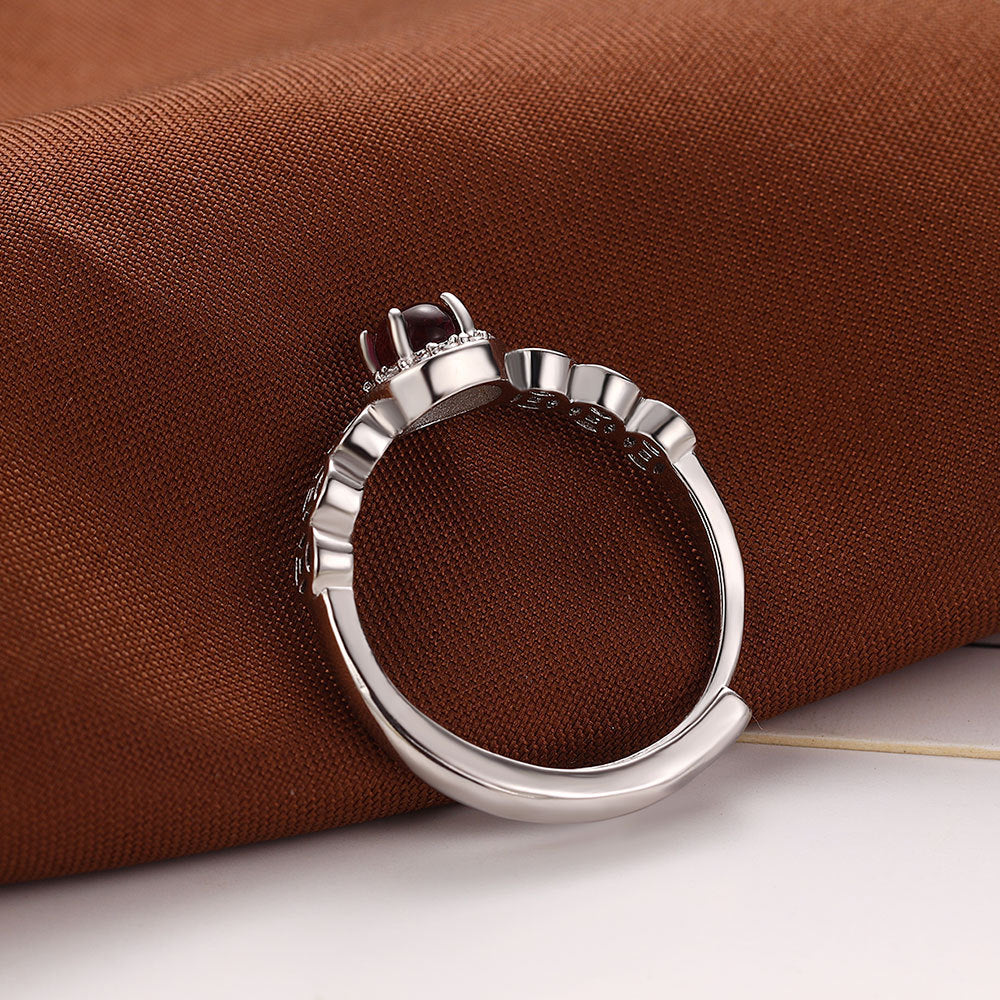 Damenring mit funkelndem Edelstein und elegantem Reliefdesign Shop Nory