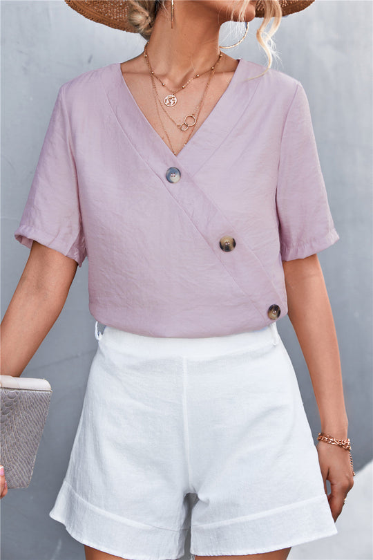 Damen lässige Bluse mit Wickeloptik und Knopfdetails