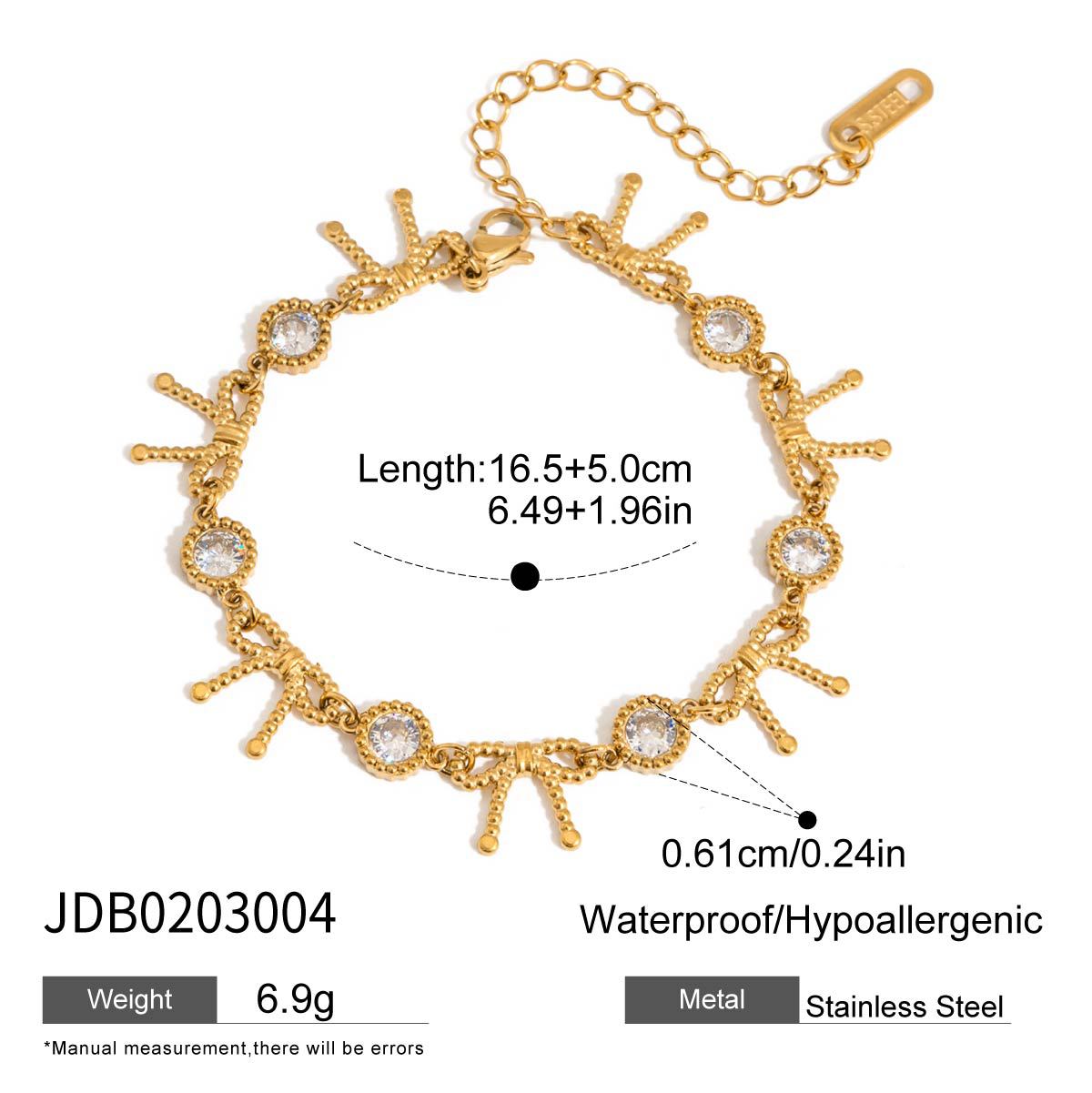 Damen Armband mit funkelnden Kristallen und elegantem Muschel-Design Shop Nory