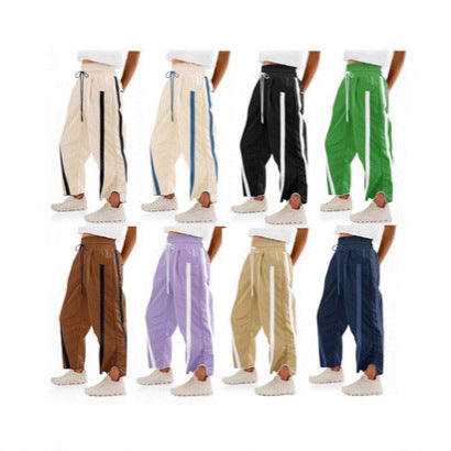 Damen nan relaxte Trackpants mit seitlichem Kontraststreifen, elastischem Smokbund und Eingrifftaschen Shop Nory