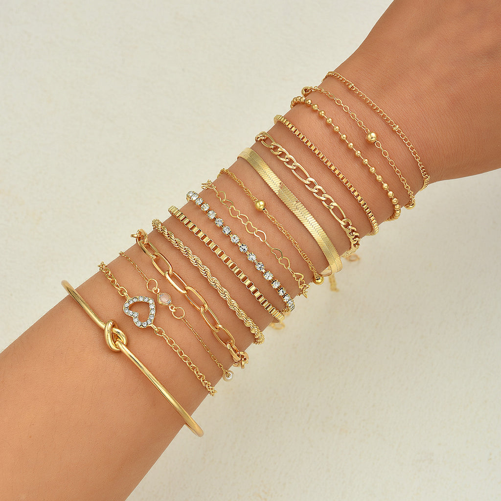 Damen Armband-Set mit glänzenden Gold- und zarten Perlendetails Shop Nory