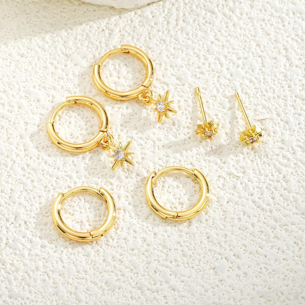 Damen Ohrschmuck mit funkelndem Sternanhänger und eleganten Creolen Shop Nory