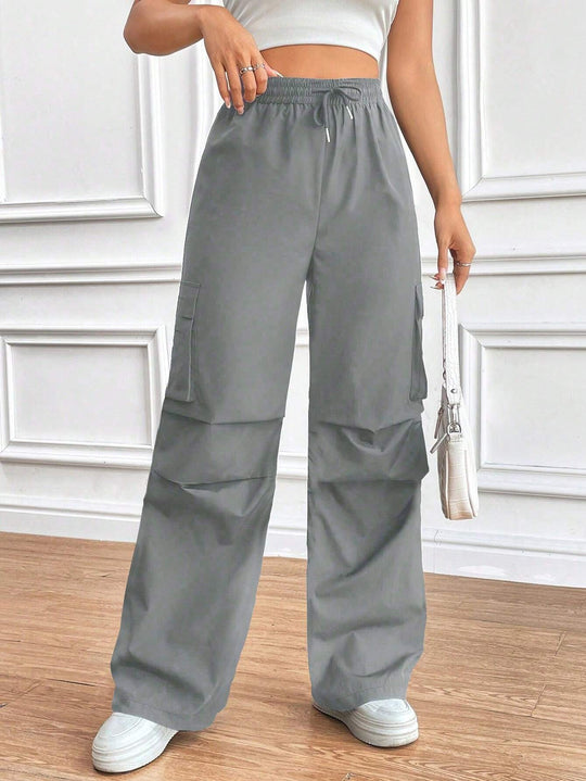 Damen Weite High‑Waist Cargo‑Hose mit Elastikbund und großen Klappentaschen Shop Nory