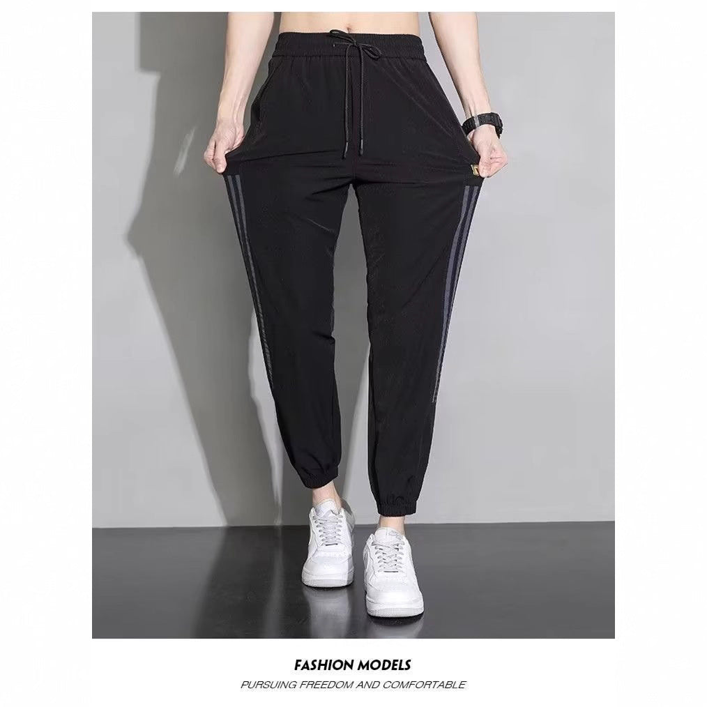 Damen Sportliche Trainingshose mit seitlichen Streifen Shop Nory
