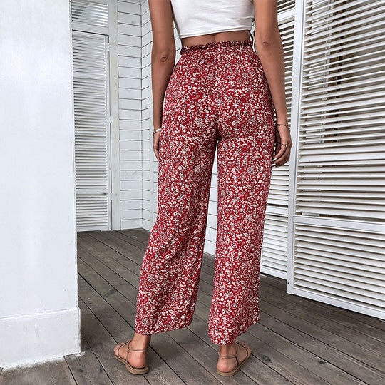 Damen Leichte High‑Waist Palazzo‑Hose mit Gummibund, Blumenprint und seitlichem Beinschlitz Shop Nory