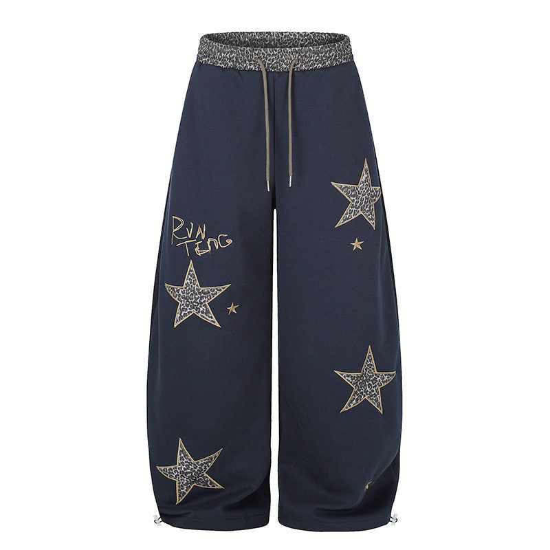 Damen Extraweite Palazzo‑Sweathose mit Leo‑Taille, Stern‑Applikationen und Kordelzug Shop Nory