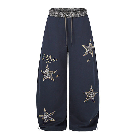 Damen Extraweite Palazzo‑Sweathose mit Leo‑Taille, Stern‑Applikationen und Kordelzug Shop Nory