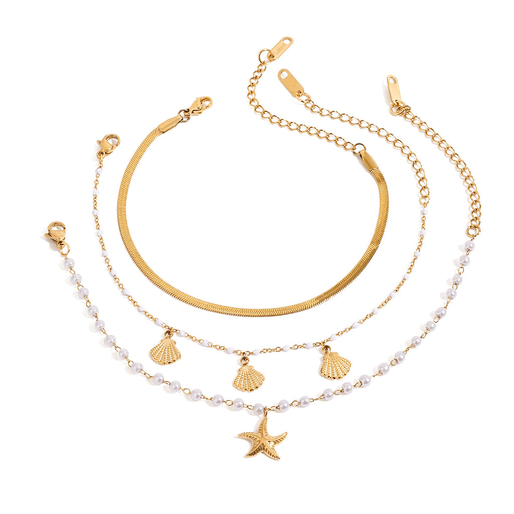 Damen Armband mit Muschel- und Sternenmotiven aus hypoallergenem Edelstahl Shop Nory