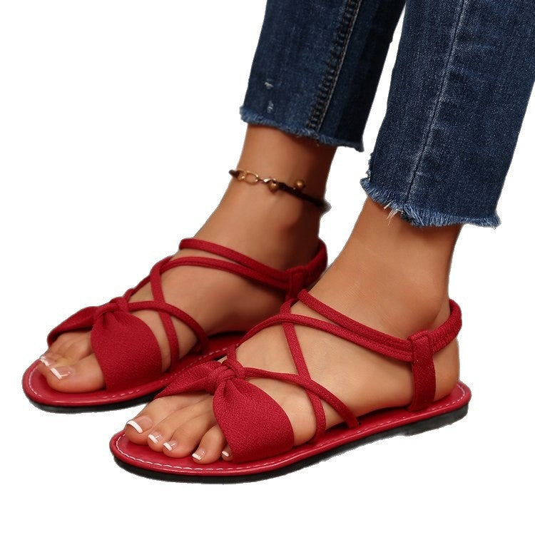 Damen Zarte Römersandalen mit Schleifen-Detail und verstellbaren Schnürriemen Shop Nory