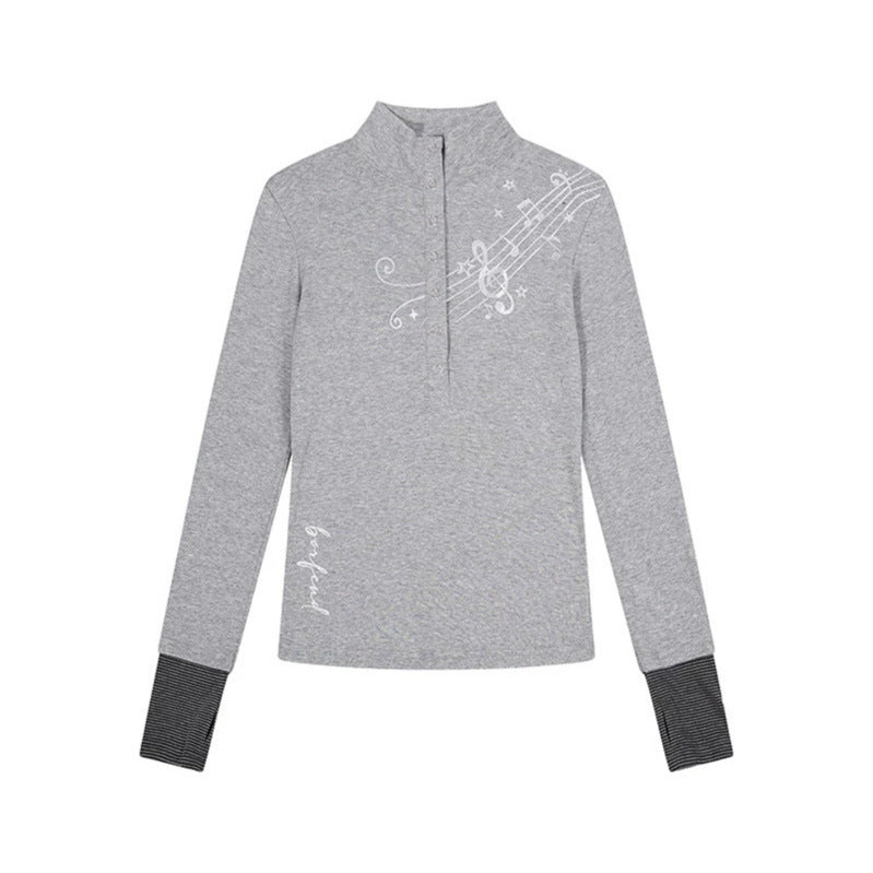 Damen Langarmshirt mit Henley-Knopfleiste, Kontrastbündchen und Notenprint Shop Nory