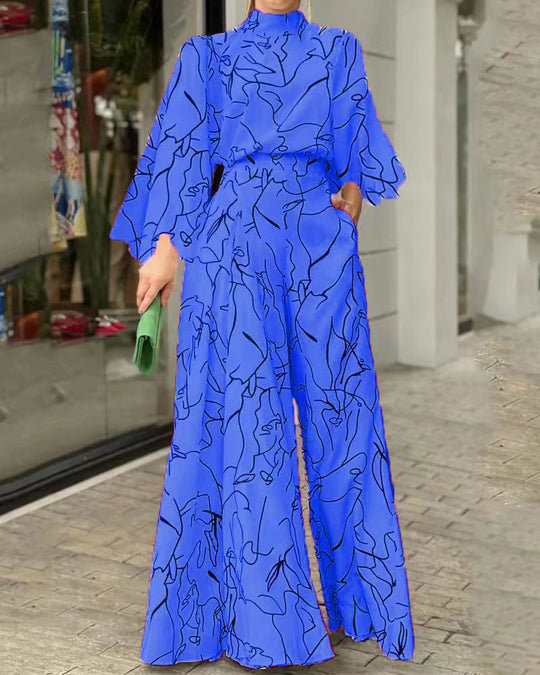 Damen Eleganter Longline Jumpsuit mit Stehkragen, Ballonärmeln und Seitentaschen Shop Nory