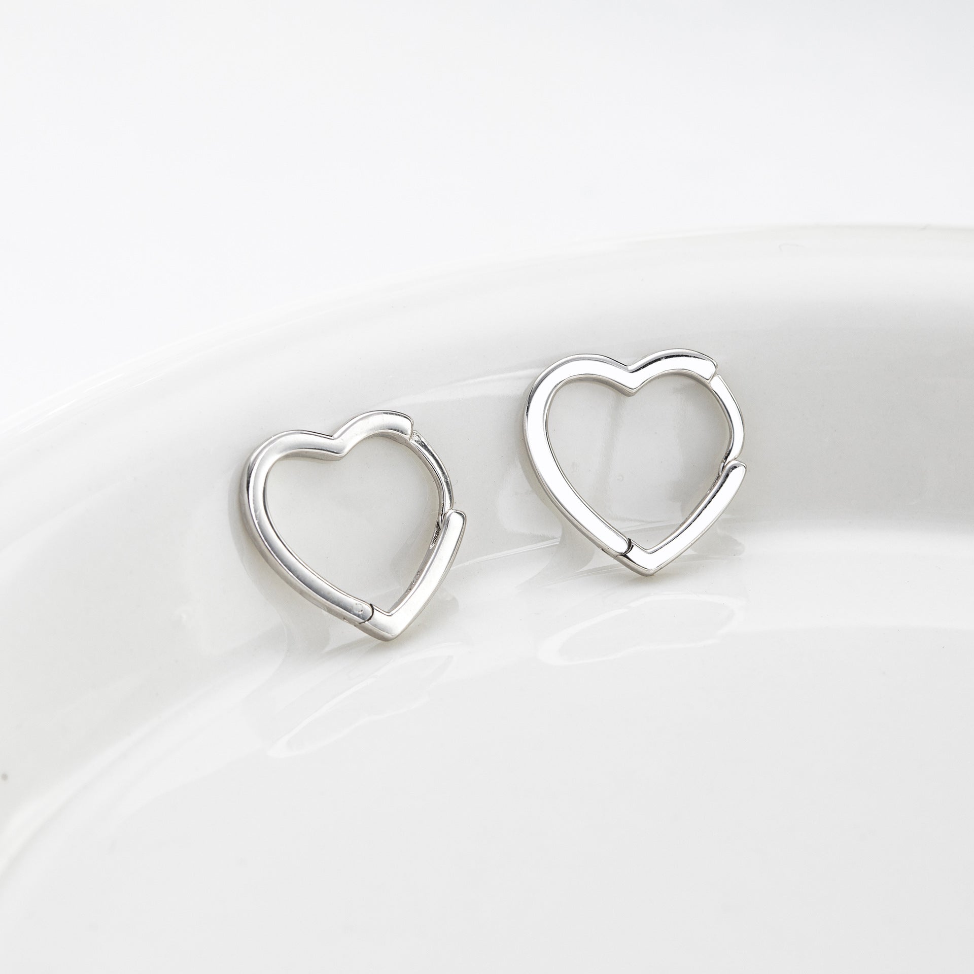 Damen Ohrringe in Herzform aus hochwertigem 925 Sterling Silber Shop Nory