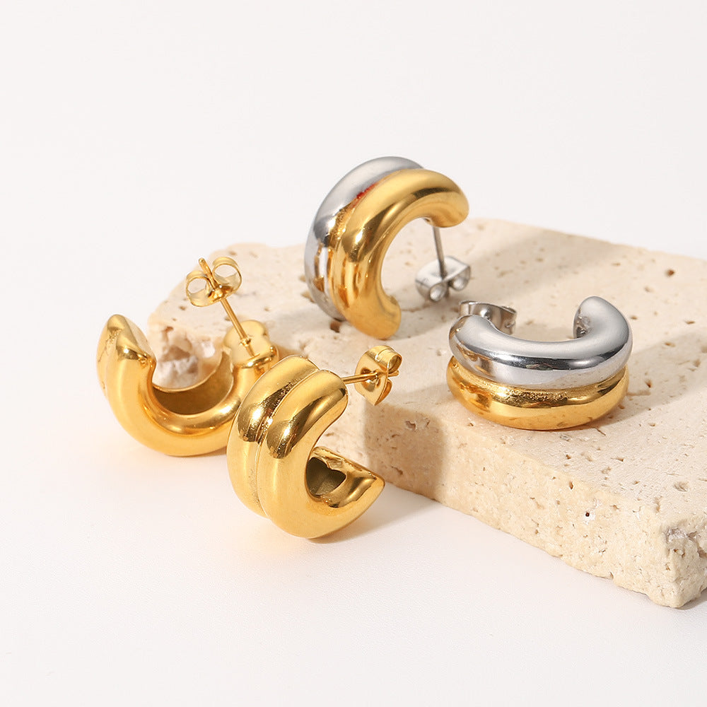 Damen Creolen mit elegantem Wellen-Design aus hochwertigem Edelstahl Shop Nory