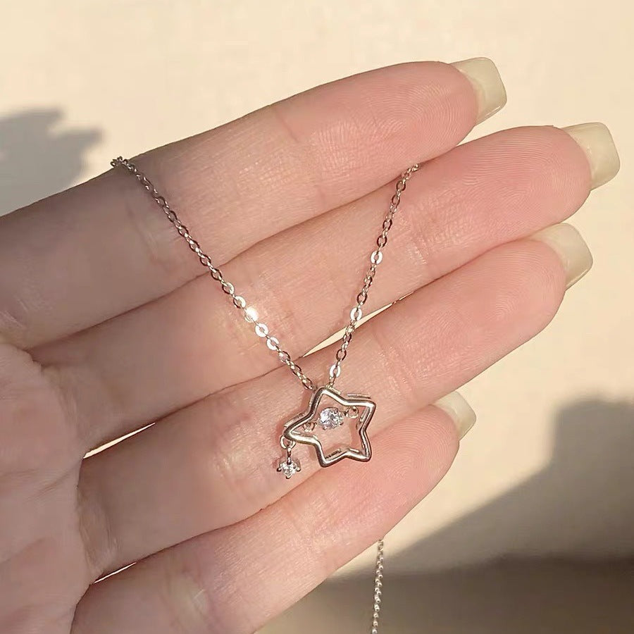 Damen Halskette mit funkelndem Sternenanhänger und zarten Details Shop Nory
