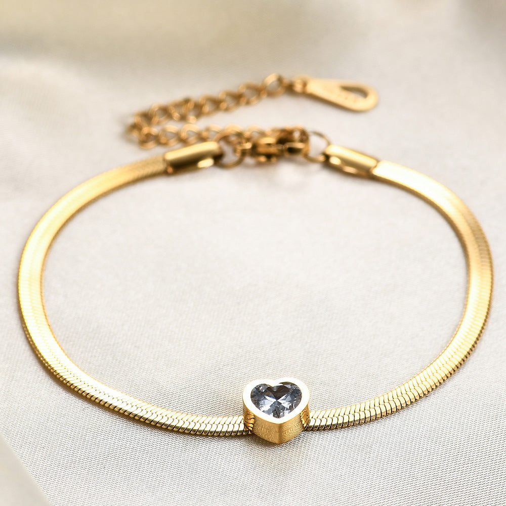 Damen Armband mit grünem Herz-Anhänger und elegantem Drahtdesign Shop Nory