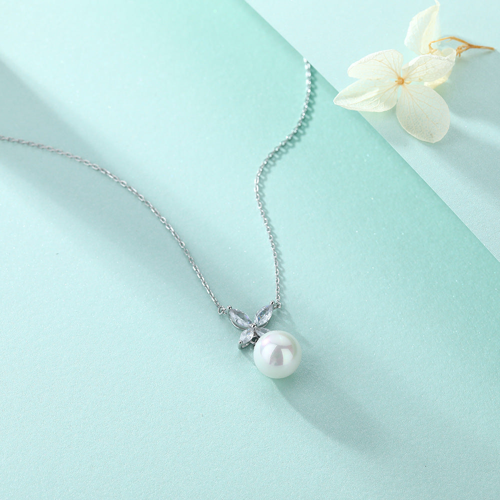 Damen Halskette mit elegantem Perlenanhänger und funkelnden Zirkonia-Details Shop Nory