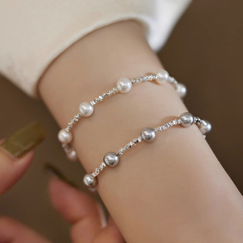 Damen Elegantes Perlenarmband mit funkelnden Akzenten Shop Nory