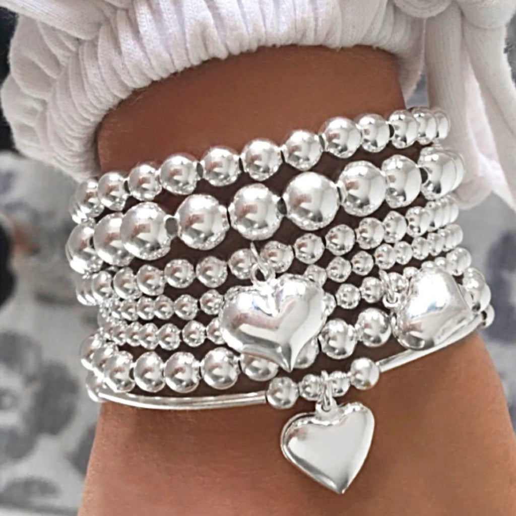 Damen Armband-Set mit funkelnden Perlen und eleganten Details Shop Nory