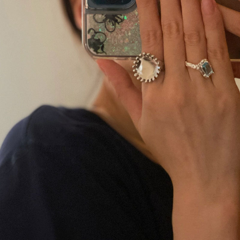 Damenring mit einzigartigem Design und facettiertem Edelstein Shop Nory