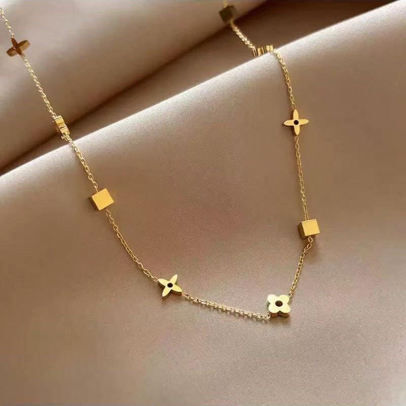 Damen Blumen-inspiriertes goldfarbenes Kettenhalsband Shop Nory