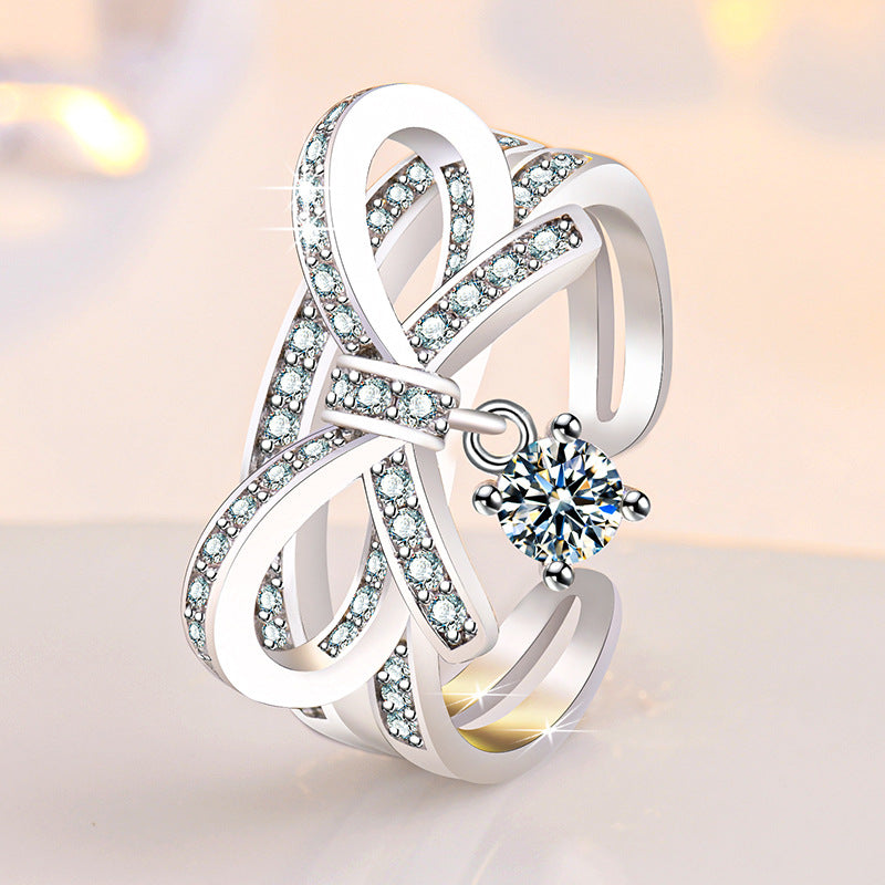 Damen Offener Ring mit kunstvollem Schleifen-Design und funkelndem Zirkonia Shop Nory