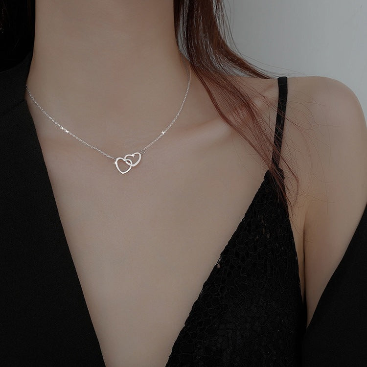 Damen Halskette mit doppeltem Herzanhänger und filigraner Silberkette Shop Nory