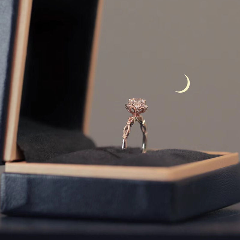 Damen eleganter Ring mit filigranem Design und funkelndem Hauptstein Shop Nory