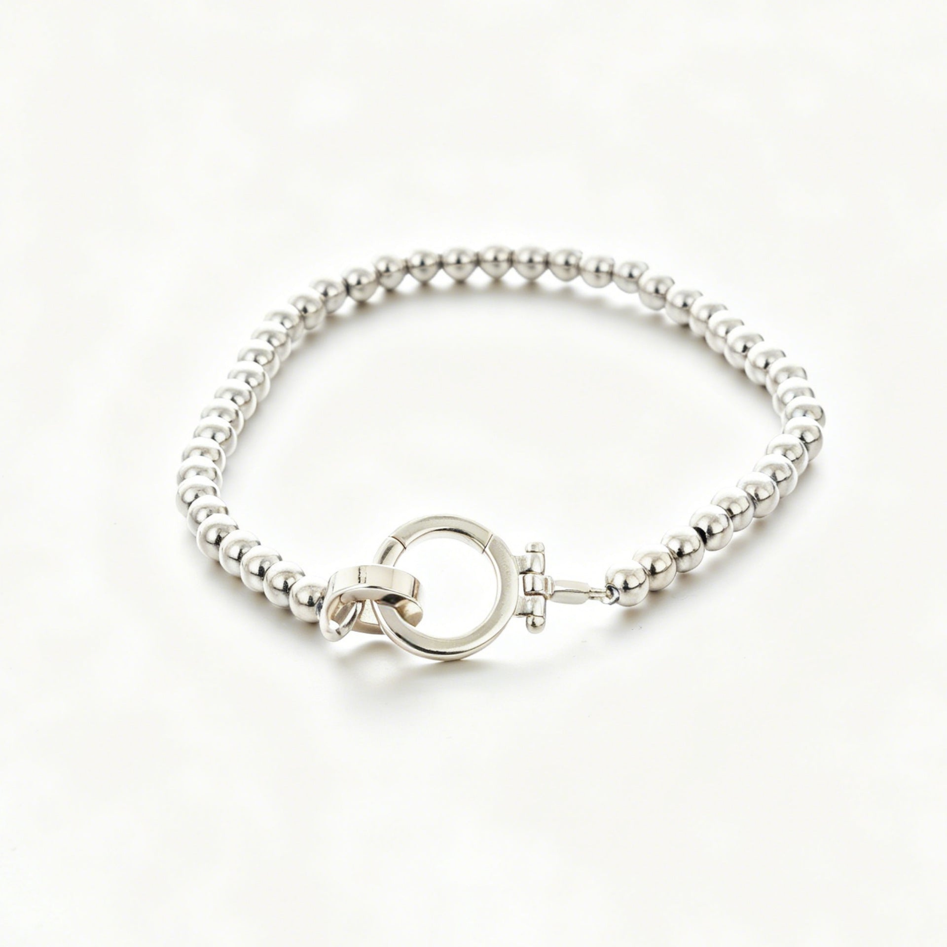 Damenarmband mit glänzenden Kugeln Shop Nory