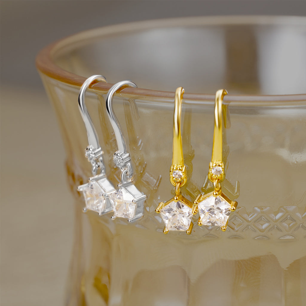 Damen Ohrringe mit funkelnden Stern-Anhängern und eleganten Details Shop Nory