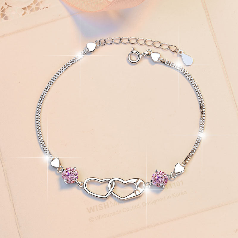 Damenarmband mit elegantem Herzdesign und funkelnden Zirkonia Shop Nory