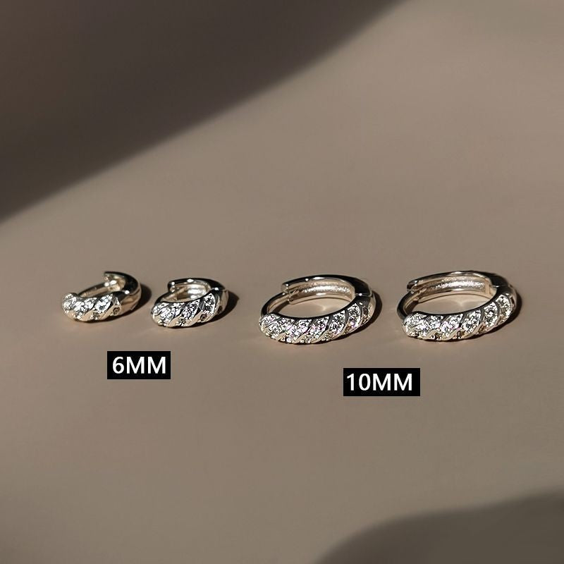 Damen Ohrhänger mit kunstvollem Zopfdesign und funkelnden Zirkonia Shop Nory