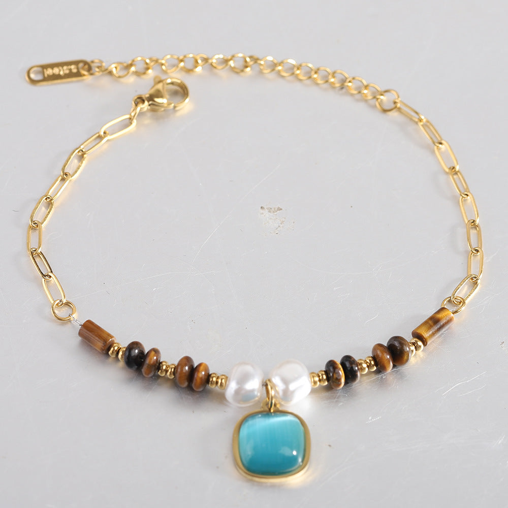 Damen Armband mit einzigartigem Edelsteinanhänger und eleganter Perlenverzierung Shop Nory