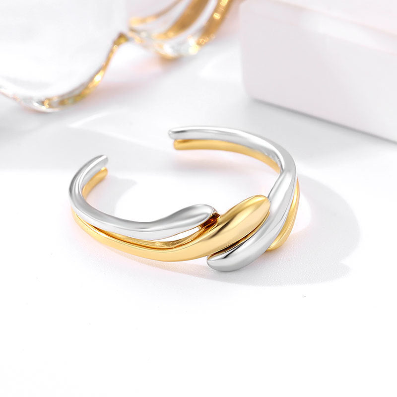 Damen Offener Ring mit geschwungenem Design und eleganter Kombination aus Silber und Gold Shop Nory
