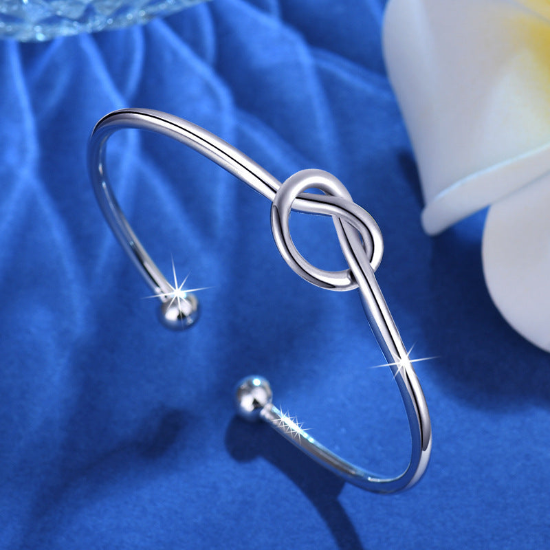 Damen Offenes Armband mit kunstvollem Knoten-Detail Shop Nory