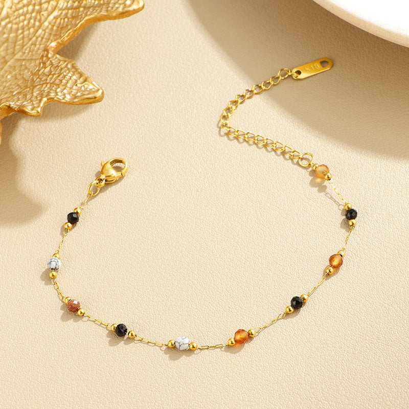 Damen elegantes Armband mit bunten Edelstein-Details und feiner Kettenstruktur Shop Nory