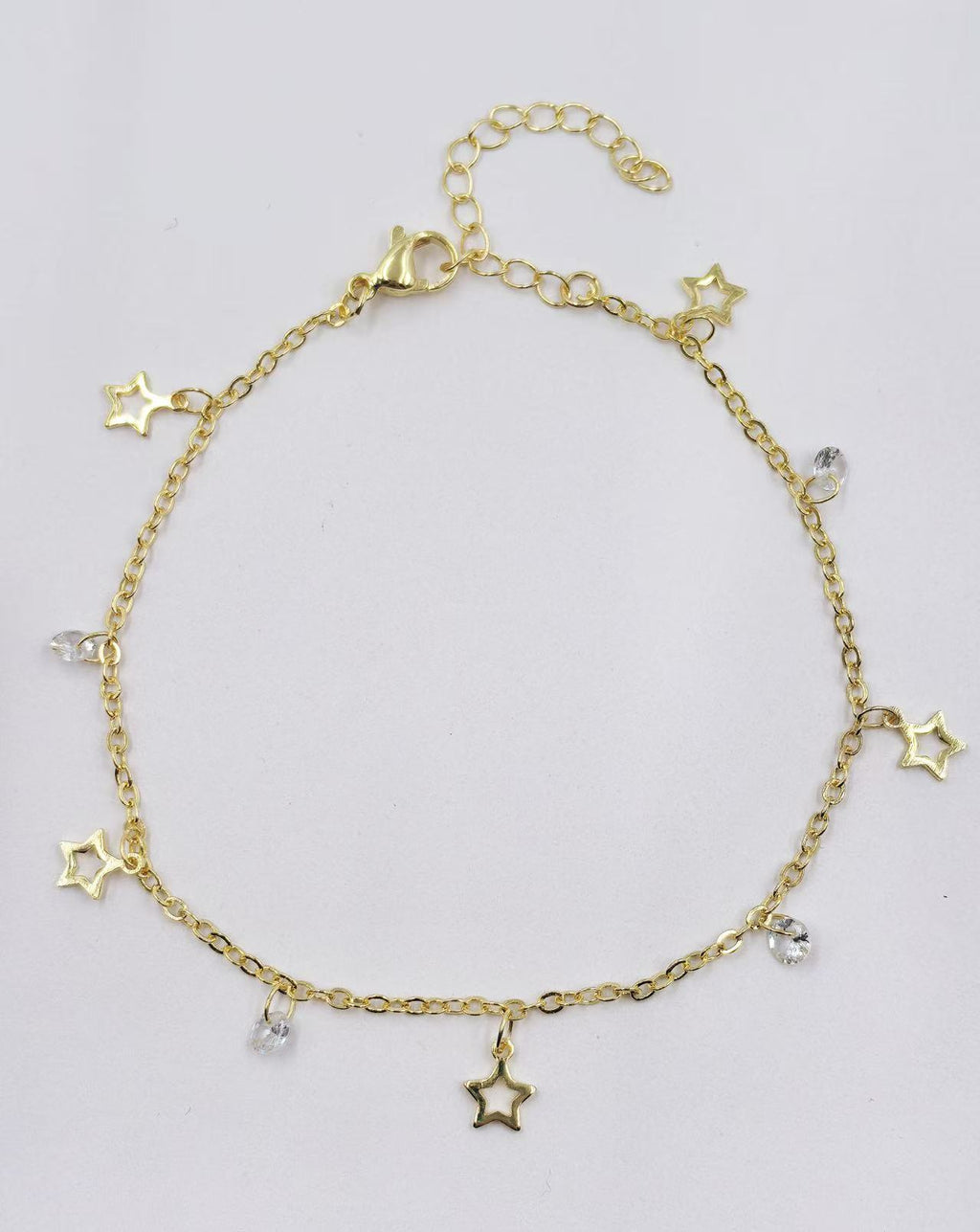 Damen Fußkettchen mit funkelnden Kristallanhängern und zartem Golddesign Shop Nory