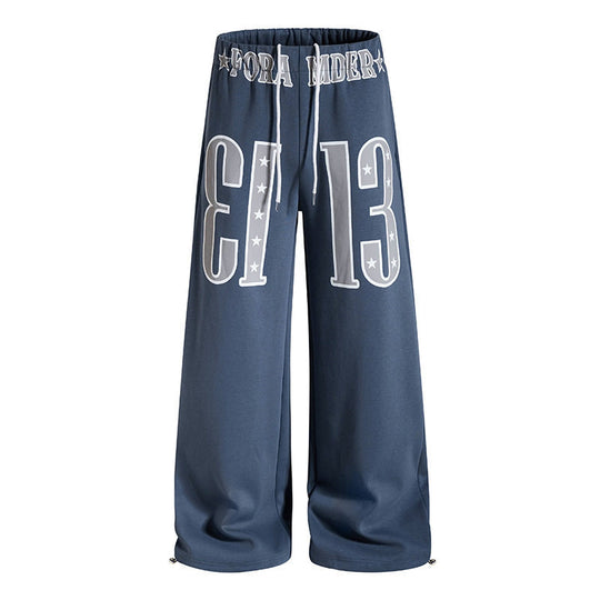Damen Weite Palazzo-Jogginghose mit hohem Komfortbund, Tunnelzug und großer Grafikfront Shop Nory
