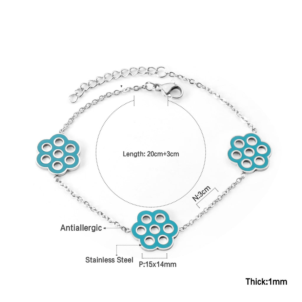 Damen Armband mit floralem Anhänger und funkelnden Akzenten Shop Nory
