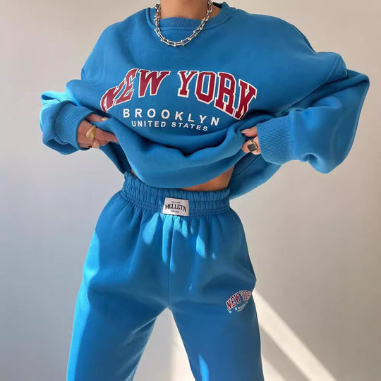 Damen Oversized Lounge-Set aus Baumwollfleece mit Collegestickerei und relaxed Jogginghose Shop Nory